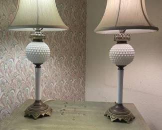Pair Milk Glass Globe Bedroom lamps.  Light bulbs are causing the light differential.