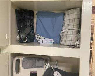 Assorted Heated pads, necks pillows, Massager