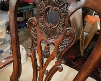 Ornate trim on chair backs