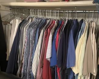 Men's Shirts.  Many with cleaning tags still attached.  Sizes M - L.     Short Sleeve and Long Sleeve.