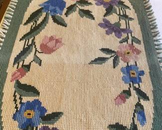 Latch Hook Rug.  Pic shows discoloration but in person does not appear to be discolored.  Should be cleaned.  Other than cleaning, excellent condition.
