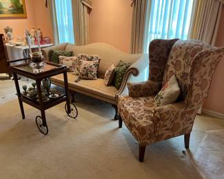Antique tea cart, Chippendale sofa, wing chair