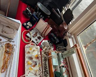 Costume jewelry, leather handbags, binoculars, cameras, misc