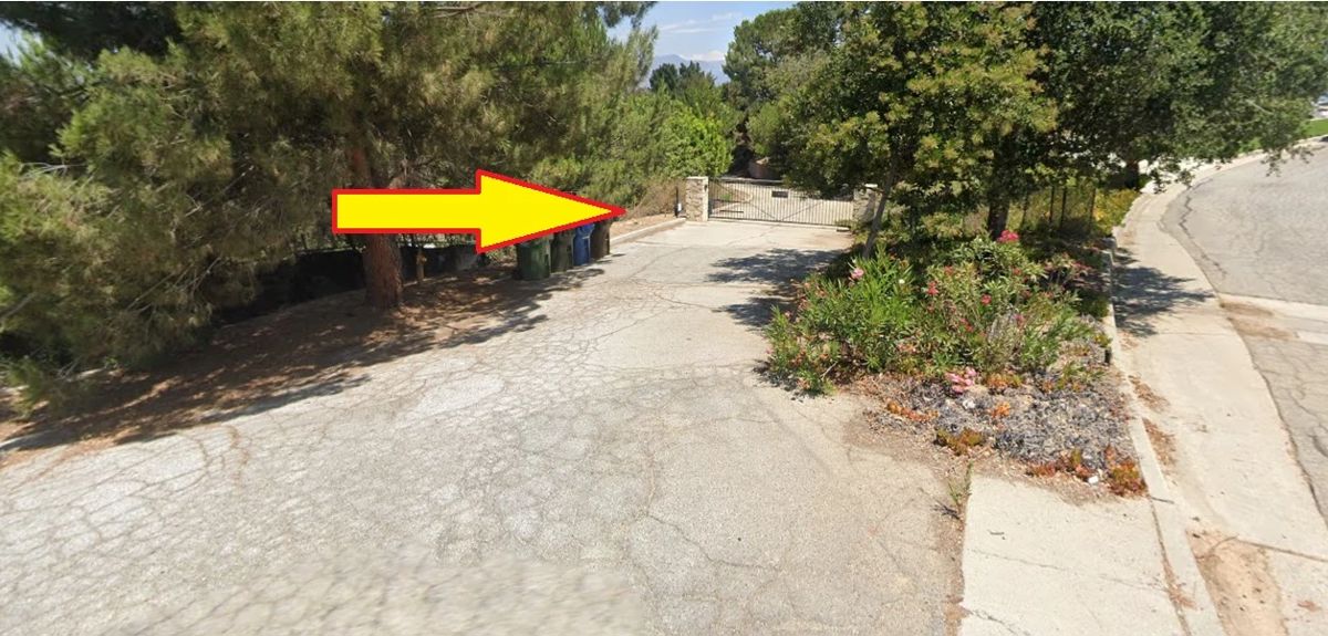 Enter through this gate at the intersection of Karen Sue Lane and Waldorf Road.  The sale is located down a long U-shaped driveway.  SOME parking is available on this driveway as long as there is space for other cars to pass.  