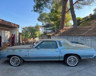 This is a 1976 Chevrolet Monte Carlo.  It needs some TLC but would be an excellent restoration project.