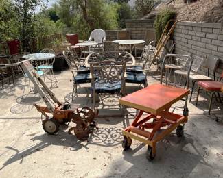 This is a different look at some of the outdoor items, including a soil tiller and dolly-lift (orange)