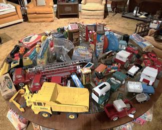 This handmade coffee table now has lots of vintage children's toys on it.