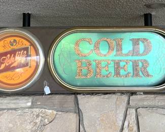 This Schlitz sign is huge, at least two feet wide.