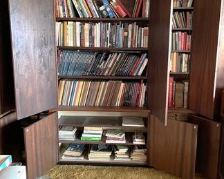 In this case, the cabinet & shelving are built-in, but the books are not.