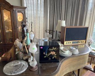 This picture shows a small selection of miscellaneous items.  (The piano is not for sale.)