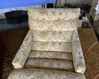 One of several upholstered chairs in the sale.  It certainly has a style to it.