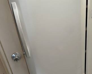 This is a Whirlpool.  You'll need to come by the sale to find out if it is a refrigerator or a freezer.