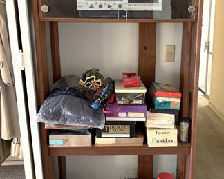 The tech at the top is a VHS tape recorder by JVC.  But the glass cabinet is certainly worth the look.