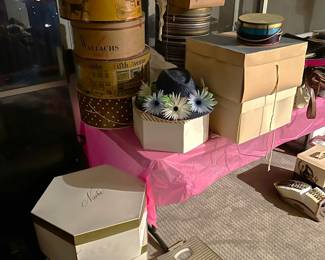 And multiple hat boxes are here, too.  Do they have hats inside?  Come by to find out.