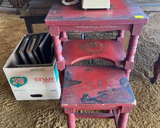 There are more than one wired telephones in the sale, but only one set of distressed side tables.