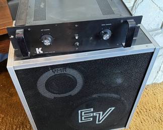 Two items to show in this photo.  On top is the Kustom X-SPA stereo power amplifier (250W RMS).  Below it is one of the pair of Electro-Voice S15-3A PA speakers.