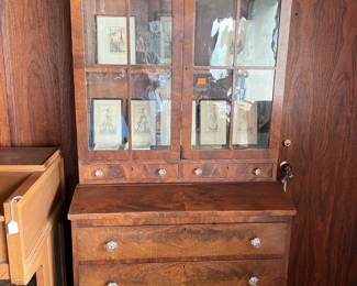 This five-drawer display cabinet can show off lots of your collection, whatever that might be.