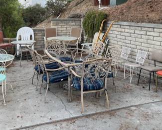 There are a number of patio furniture to be had here.  Some need restoration.