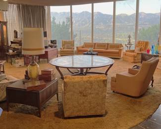 The table in the center was apparently made by the owner of the house (hence the woodworking equipment and tools available in the second weekend, date TBD).  But you can see the chairs, sofa, and side table as well.