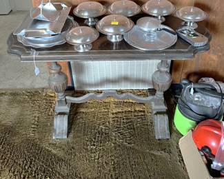 This time the table is for sale, along with the serving trays above it.