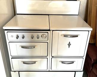 This is a vintage Wedgewood stove/oven combination in excellent shape. 