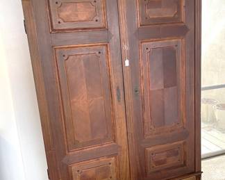 A second armoire is available for sale.