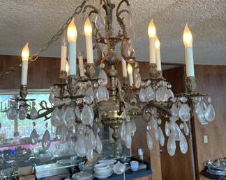 For those of you looking for chandeliers, this one would look really nice (with a bit of cleaning).