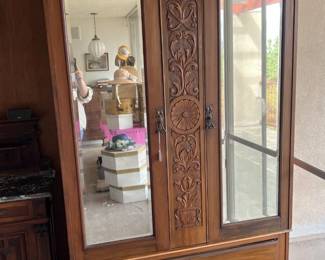 This armoire with double-mirrored doors could be yours.  