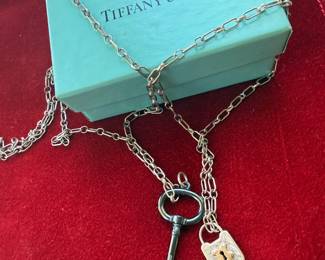Super RARE TIFFANY & CO. Piece - Black Titanium Key with sterling chain and sterling lock with gold. MINT CONDITION!