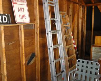 Tall aluminum ladder, and small heavy wood ladder