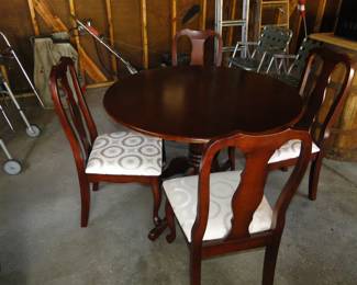 Mahogany dining table with matching chairs