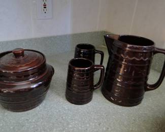 Brown pitcher and mugs