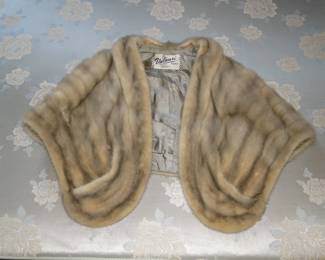 Fur wrap, made in Detroit, with fun hand pockets