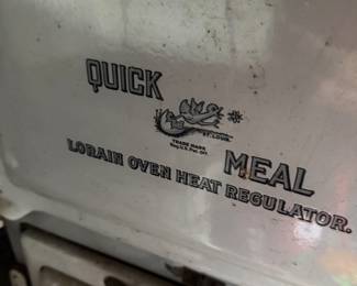 One of two fine enameled gas ovens.
This one is by Quick Meal Lorain Oven Heat Regulator