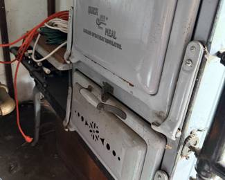 One of two antique enamel ovens