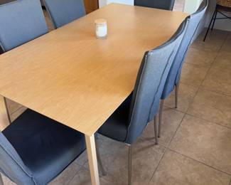Set of 6 Gray Modern Chairs $250 // Modern Light Wood Table 35.5" Width x 63" Length x 29" Height $250 // Set $500