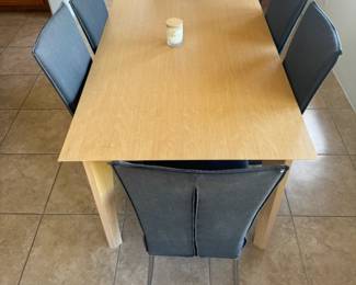 Set of 6 Gray Modern Chairs $250 // Modern Light Wood Table 35.5" Width x 63" Length x 29" Height $250 // Set $500