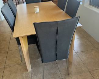 Set of 6 Gray Modern Chairs $250 // Modern Light Wood Table 35.5" Width x 63" Length x 29" Height $250 // Set $500