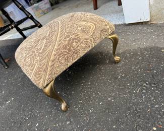 little foot stool with brass legs