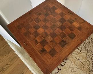 Antique marquetry chess/checkerboard table opens to compartment with onyx chess pieces. Alternate view.