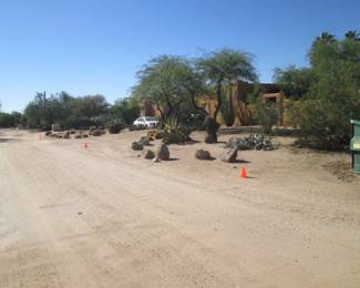 Please do not park on side of road or driveway where the orange cones are located.  Only room for 1 lane for parking.  Additional parking past the sale entrance drive.