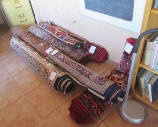Rugs Rolled Up Due to Lack of Space...Feel Free to Look at Them.