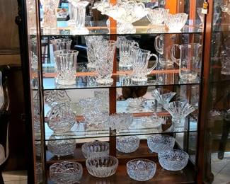 LIGHTED CABINET- NOT ALL GLASSWARE PICTURED IS AVAILABLE.  WE STILL HAVE SOME GORGEOUS GLASSWARE 