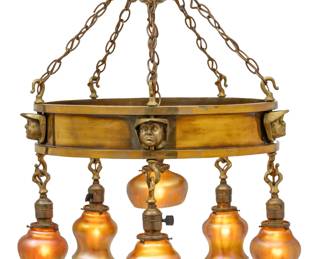 Lot 28
Attributed to E. F. Caldwell Arts And Crafts Bronze And Quezal Art Glass Chandelier 1910-1915, H 29" Dia. 21"