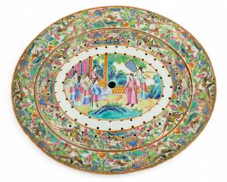 Lot 87
Cantonese Famille Rose Mandarin Porcelain Large Deep Well Platter with Inset Pierced Drain Early 19th C., H 2.75" W 3.75" L 18.25"
