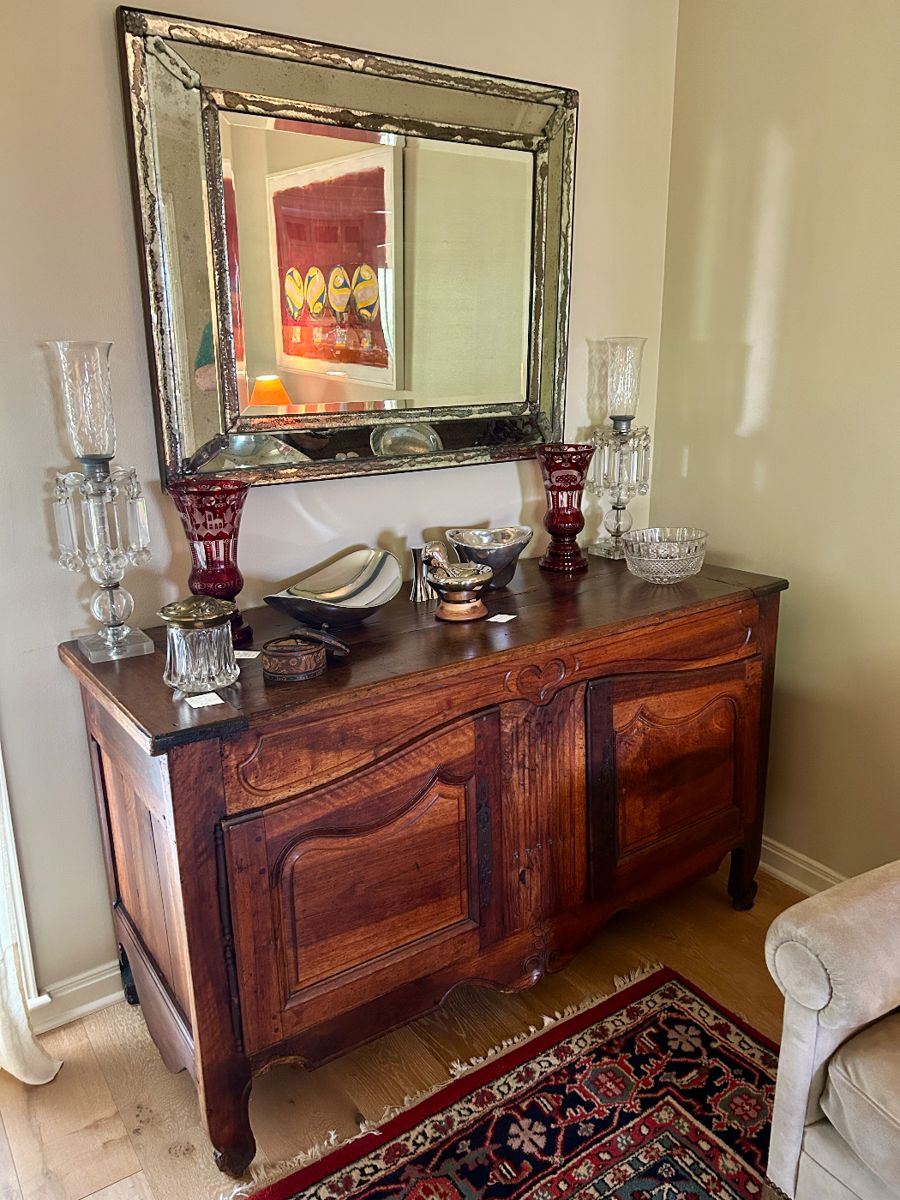 ANTIQUE SIDEBOARD WITH "HEART" MOTIF, Square nails, brass escutcheon, Measurements: approximately 5 foot across, 3 ft. tall and 2 ft. deep, 18th century Venetian beveled mirror with rosette, with characteristic wear measuring approx.  purchased at the Mews in Dallas 42" by 32"  