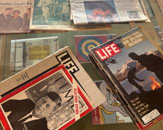 Back date magazines and newspapers chronicling great moments in history.