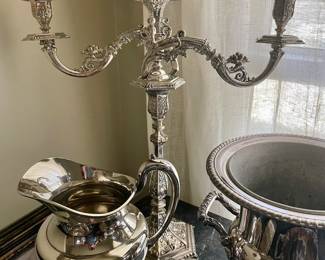 Reed and Barton water pitcher and magnificant pair of Sheffield candelabras.