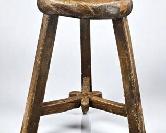An Antique Carved Wood Three-Legged Stool, Possibly Elm, Likely Used As A Milking Stool