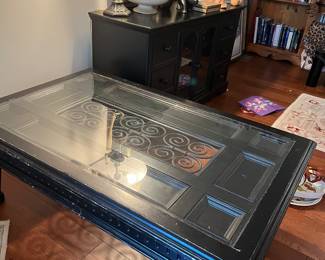 Large black wood and glass with iron inlay table …